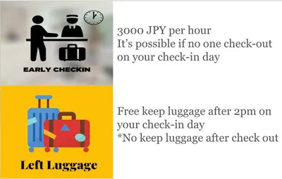a couple of signs with luggage and a clock at \u7af9\u30ce\u585a \u30d7\u30ec\u30df\u30a2 in Tokyo