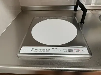 a round mirror sitting on top of a counter at jtr\u6d45\u8349\u6a4b302 in Tokyo