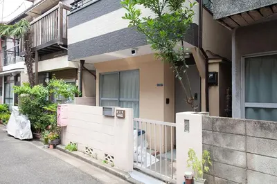 a house with a fence in front of it at \u697d\u5bbf \u58a8\u7530II 003t in Tokyo