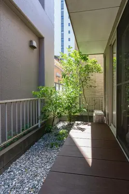 a balcony of a building with a garden at \u512a\u697d\u82d1 113t in Tokyo