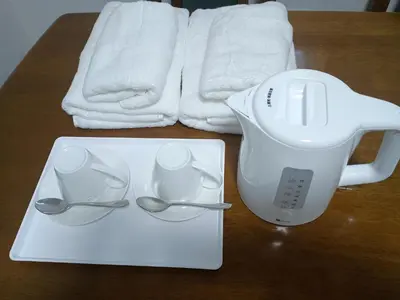 a white blender and two spoons on a table at N's room & park ,Tokyo, Guest House - Vacation STAY 18814 in Tokyo
