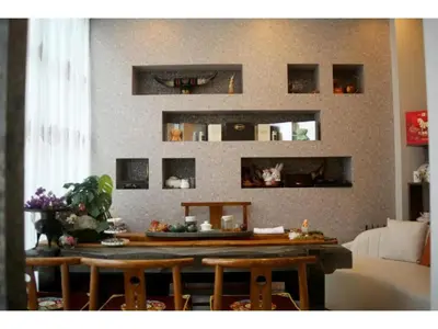 a room with a table and some chairs and a wall at MIYAVI hotel - Vacation STAY 75556v in Tokyo