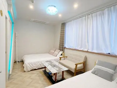 a hospital room with two beds and a window at MIYAVI hotel - Vacation STAY 75566v in Tokyo