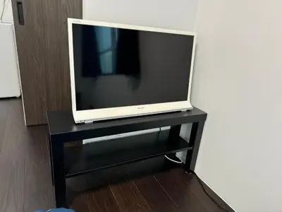 a flat screen tv sitting on a black stand at Tokyo Stay Top Ikebukuro #203 in Tokyo