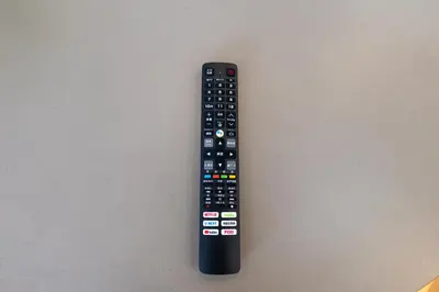 a remote control sitting on top of a table at FINOA Asakusa Sky Terrace in Tokyo