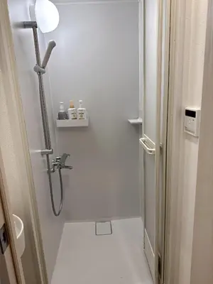 a bathroom with a shower and a toilet at rd\u6c11\u6cca2F in Tokyo
