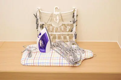 a iron is sitting on top of a table at MINE HOME\u6771\u6c60\u888b 117t in Tokyo