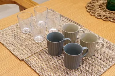 a group of cups and glasses on a table at MINE HOME\u6771\u6c60\u888b 117t in Tokyo