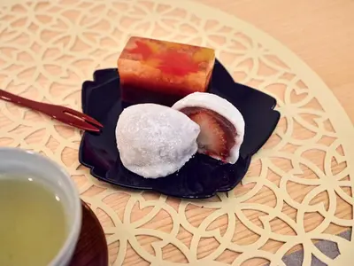 a plate with three different types of desserts on it at Mejiro 501 in Tokyo