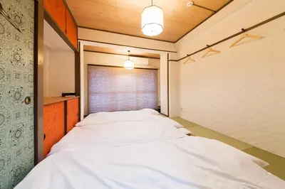a bedroom with a large bed in a room at \u697d\u5bbf Itabashi 011T in Tokyo