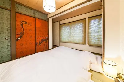 a bedroom with a large white bed in a room at \u697d\u5bbf Itabashi 011T in Tokyo