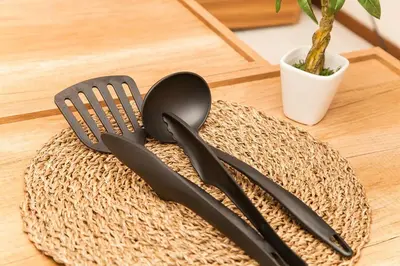 a table with two utensils and a fork and knife at Y's INN Koiwa 010T in Tokyo