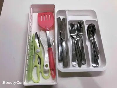 a plastic container with utensils in a tray at Shinjuku 105 in Tokyo