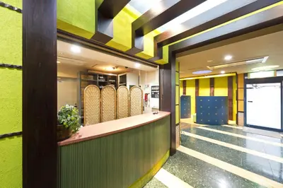 a lobby with surfboards on display in a building at International Hotel Kabukicho in Tokyo