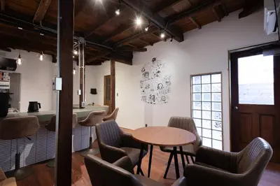 a dining room with a table and chairs at \u30ca\u30ab\u30ce\u30b3\u30df\u30c1 Nakanokomichi in Tokyo