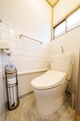 a bathroom with a toilet and a bath tub at Tokyo Ninja \u5c4b\u6577 in Tokyo
