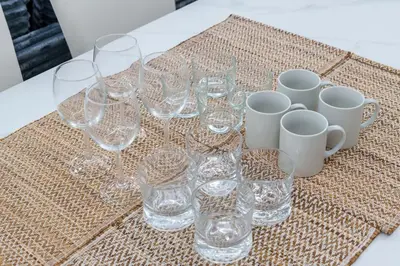 a group of wine glasses and cups on a table at SPACESHIP UNIT1 122Ta in Tokyo