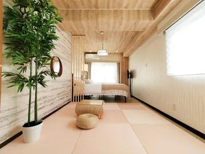 a bedroom with a bed and a potted plant at G91\u65b0\u5bbf\u6700\u4e2d\u5fc3 \u6771\u65b0\u5bbf\u7ad95\u5206-Shinjuku center 5 mins to St, Max 5P \u65b0\u5bbf \u6d89\u8c37 \u8868\u53c2\u9053 \u6c60\u888b \u4e0a\u91ce \u4ee3\u4ee3\u6728 \u94f6\u5ea7 \u539f\u5bbf in Tokyo