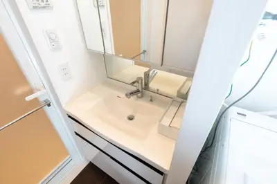 a bathroom with a sink and a mirror at LIVCITY Kinshicho 302 in Tokyo
