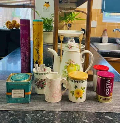a group of coffee cups sitting on a counter at The class omote in Tokyo