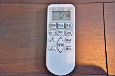 a remote control sitting on top of a wooden table at Ikebukuro 10min Kanamecho 9min Max 2 NVF101 in Tokyo