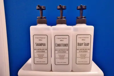 three bottles of shampoo and laundry detergent sitting on a sink at Ikebukuro 10min Kanamecho 9min Max 2 NVF101 in Tokyo