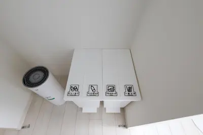 a room with a trash can and a radiator at LIVCITY Kinshicho 602 in Tokyo