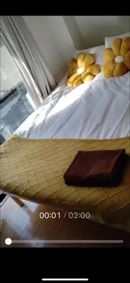 a bed with a bunch of bread on it at 21\u89c2\u666f\u9633\u53f0\u623f \u5927\u7a7a\u95f4\u536b\u6d74\u53a8\u623f \u6d17\u8863\u673a \u8f66\u7ad9\u6b65\u884c3\u5206\u949f \u4e0a\u91ce \u6d89\u8c37 \u8fea\u58eb\u5c3c \u673a\u573a \u5750\u8f66\u76f4\u8fbe in Tokyo