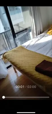 a close up of a bed in a room at 21\u89c2\u666f\u9633\u53f0\u623f \u5927\u7a7a\u95f4\u536b\u6d74\u53a8\u623f \u6d17\u8863\u673a \u8f66\u7ad9\u6b65\u884c3\u5206\u949f \u4e0a\u91ce \u6d89\u8c37 \u8fea\u58eb\u5c3c \u673a\u573a \u5750\u8f66\u76f4\u8fbe in Tokyo