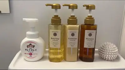 a group of four bottles of hair products on a shelf at 41\u89c2\u666f\u9633\u53f0\u623f \u5927\u7a7a\u95f4\u536b\u6d74\u53a8\u623f \u6d17\u8863\u673a \u8f66\u7ad9\u6b65\u884c3\u5206\u949f \u4e0a\u91ce \u6d89\u8c37 \u8fea\u58eb\u5c3c \u673a\u573a \u5750\u8f66\u76f4\u8fbe in Tokyo