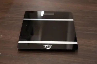 a black device sitting on top of a wooden table at \u738b201\u8d85\u5927\u9732\u53f0\u6574\u5957\u79c1\u4eba\u536b\u6d74\u53a8\u623f \u6d17\u8863\u673a \u8f66\u7ad9\u6b65\u884c5\u5206\u949f \u4e0a\u91ce\u7ad9\u5730\u94c1\u76f4\u8fbe in Tokyo