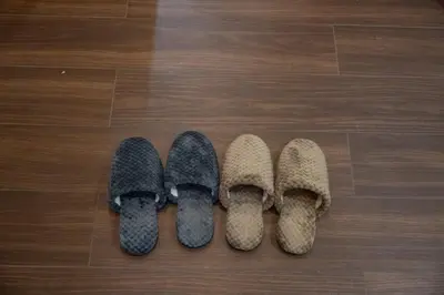 three pairs of shoes on a wooden floor at \u738b102\u6574\u5957\u79c1\u4eba\u536b\u6d74\u53a8\u623f \u6d17\u8863\u673a \u8f66\u7ad9\u6b65\u884c5\u5206\u949f \u4e0a\u91ce\u7ad9\u5730\u94c1\u76f4\u8fbe in Tokyo