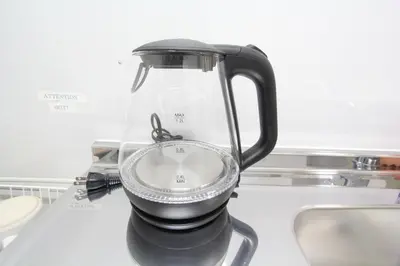 a black blender sitting on top of a counter at LUANA in SHINJUKU in Tokyo