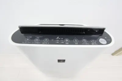 a cell phone sitting on top of a white object at LUANA in SHINJUKU in Tokyo