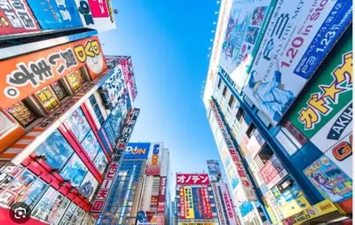 a group of buildings with comic books on them at jtr\u6d45\u8349\u6a4b502 in Tokyo