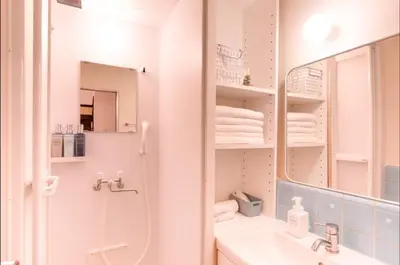 a bathroom with a sink and a mirror at \uff26\uff55\uff57\uff41\uff26\uff55\uff57\uff41 in Tokyo
