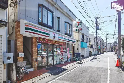 a street with a store on the side of a building at MAT ARAIYAKUSHI West in Tokyo