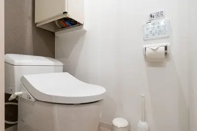 a small bathroom with a toilet and a sink at MAT ARAIYAKUSHI West in Tokyo