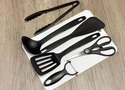 a white tray with utensils on top of a table at \u6d45\u8349\u4e09\u4e01\u76ee\u6238\u5efa\u3066 in Tokyo