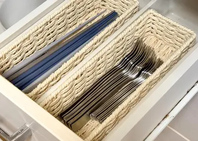 a drawer with a basket with utensils in it at \u6d45\u8349\u4e09\u4e01\u76ee\u6238\u5efa\u3066 in Tokyo
