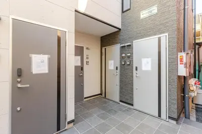 a hallway with three doors in a building at ksf\u4e0a\u6c60\u888b3\u4e01\u76ee102 in Tokyo
