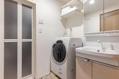 a kitchen with a washing machine and a sink at ksf\u4e0a\u6c60\u888b3\u4e01\u76ee202 in Tokyo