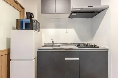 a small kitchen with a sink and a refrigerator at ksf\u4e0a\u6c60\u888b3\u4e01\u76ee202 in Tokyo