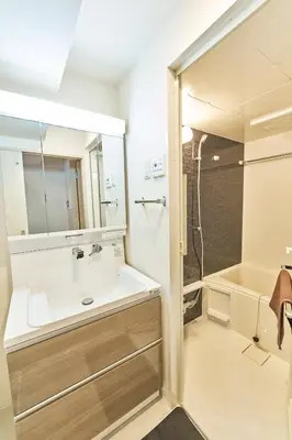 a bathroom with a sink and a shower at Nomadland Shinagawa Omori 1004 in Tokyo
