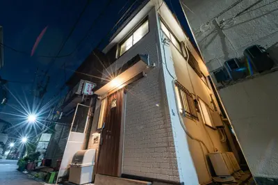 a door to a building with a light on it at \u697d\u9038\u30b0\u30eb\u30fc\u30d7Skytree 105T in Tokyo
