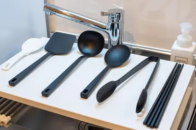 a group of utensils sitting on top of a counter at \u697d\u9038\u30b0\u30eb\u30fc\u30d7Skytree 105T in Tokyo