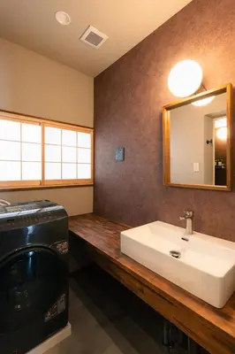 a bathroom with a sink and a mirror at ERA 1927 Koenji in Tokyo
