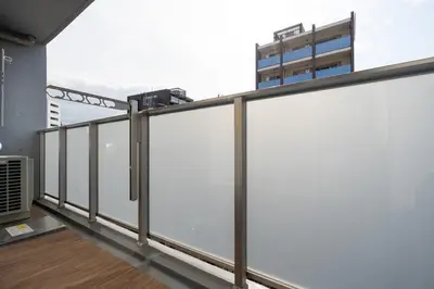 a row of white panels on a balcony at Miyabi \u795e\u697d\u5742 in Tokyo