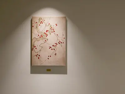 a painting on a wall with a light on it at Minn Nihonbashi Suitengumae in Tokyo