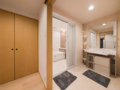 a bathroom with a shower and a sink and a tub at Miyabi Inn-Higashi Koiwa in Tokyo